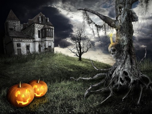 Happy Halloween theme Mystical tree on the background of an abandoned house with orange pumpkins