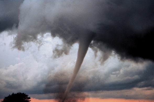 Tornado-Storm IMAGE A large and powerful tornado funnel looms in the sky. IMAGE