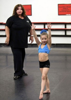 DanceMoms-AbbyLee-student IMAGE Abby Lee Miller of Dance Moms with a student IMAGE