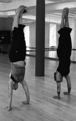IMAGE Two dancers test each other in a handstand contest. IMAGE