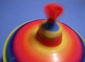 Close-up of a spinning toy top