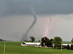 Picture of a tornado and lightning strike