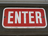IMAGE A red and white 'enter' sign IMAGE
