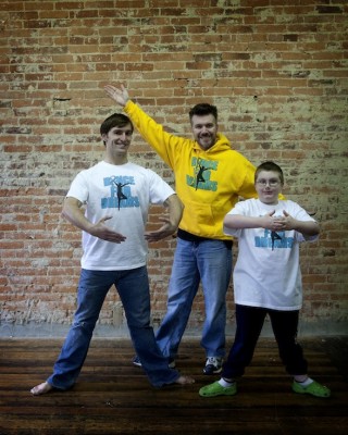 [image] Dance instructor Michael Patterson, Brian and his son, Dominic [image]