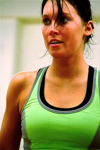 IMAGE A dancer looks tired and sweaty during her dance rehearsal. IMAGE