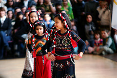 IMAGE Children perform cultural dances for an audience IMAGE